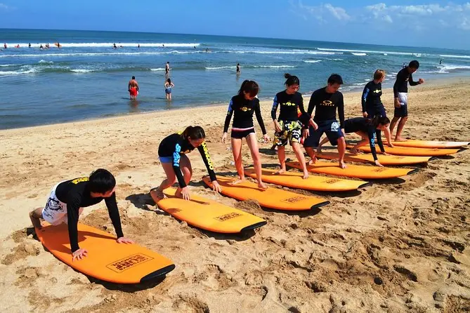 surfing lesson at kuta beach by 27 surf bali